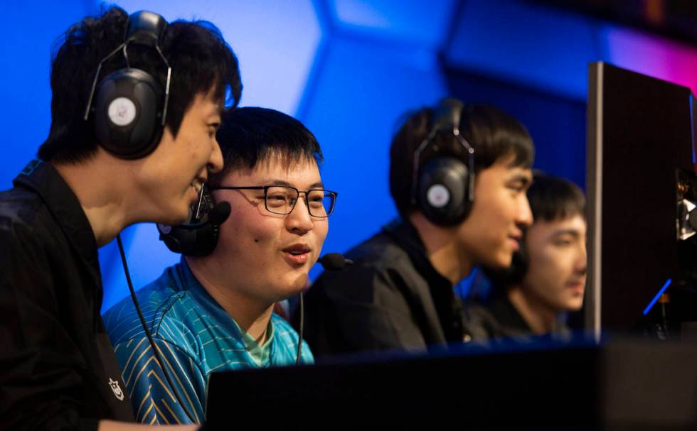 Xiao Wang, left, and Jian Zihao, second from left, known together as UziGod, play tandem League ...