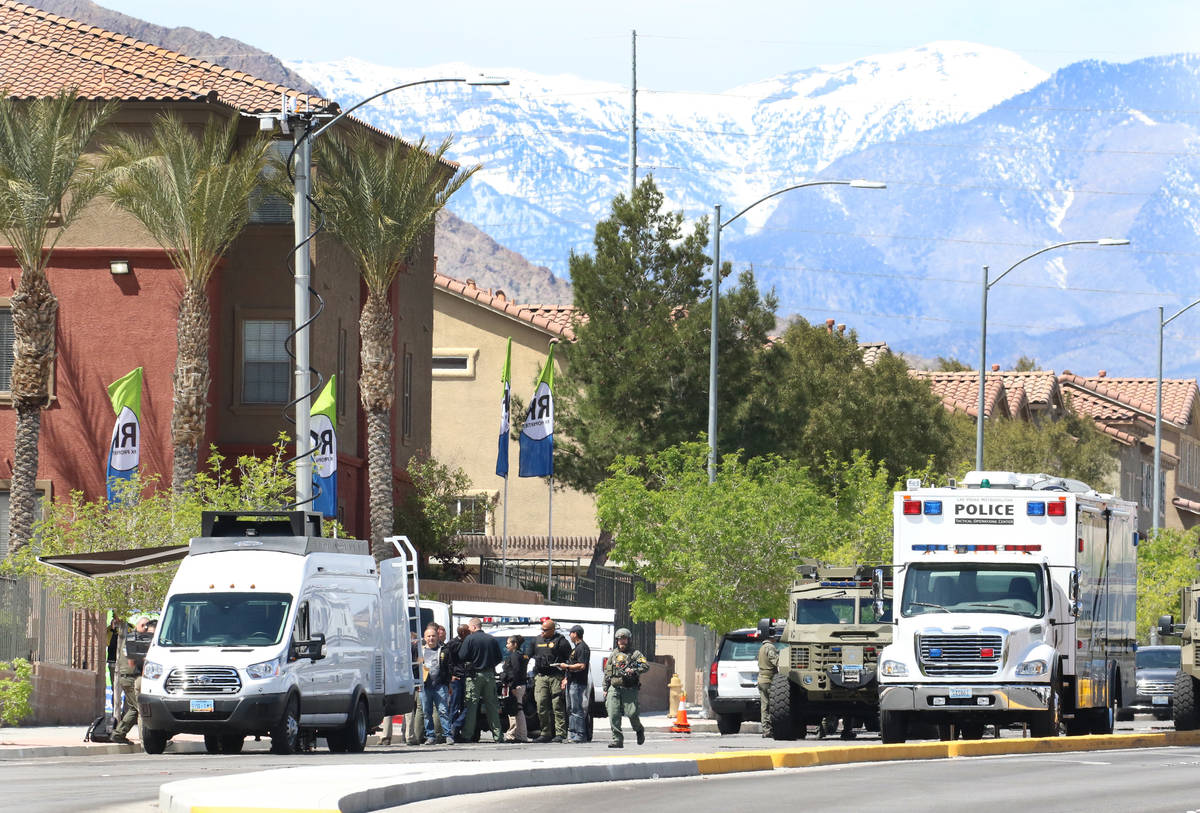 The SWAT team responded to the scene where a domestic violence suspect barricaded in a vehicle ...