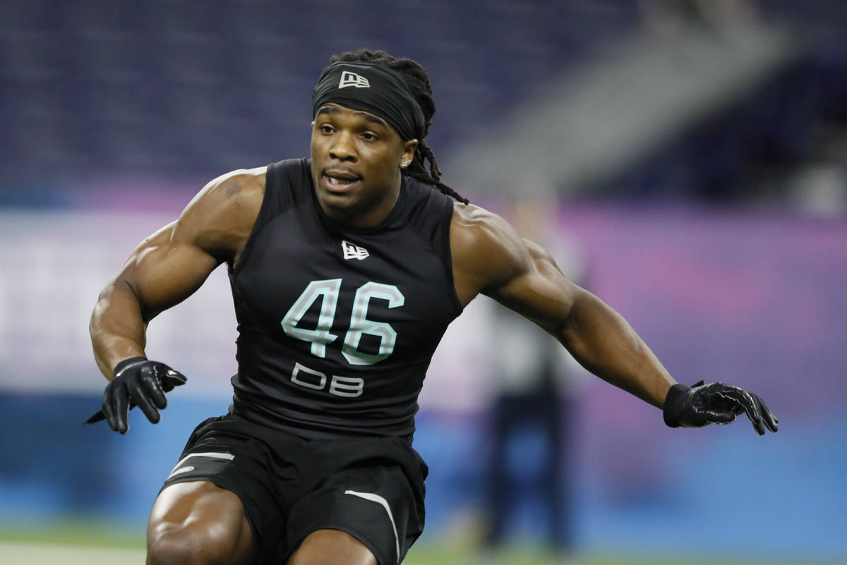 Lenoir-Rhyne defensive back Kyle Dugger runs a drill at the NFL football scouting combine in In ...