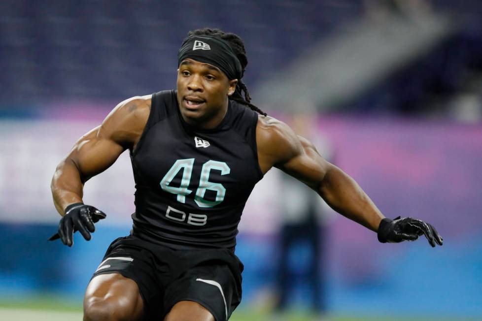 Lenoir-Rhyne defensive back Kyle Dugger runs a drill at the NFL football scouting combine in In ...