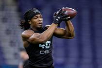 FILE - In this March 1, 2020, file photo, Lenoir-Rhyne defensive back Kyle Dugger runs a drill ...