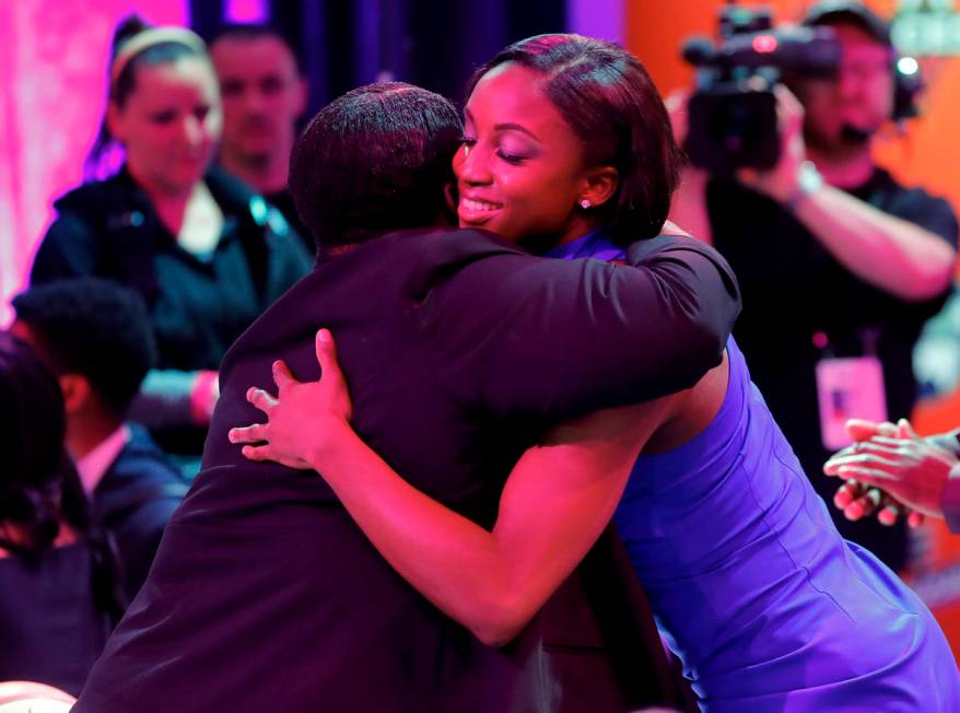 Notre Dame's Jackie Young hugs a relative after being selected by the Las Vegas Aces as the num ...