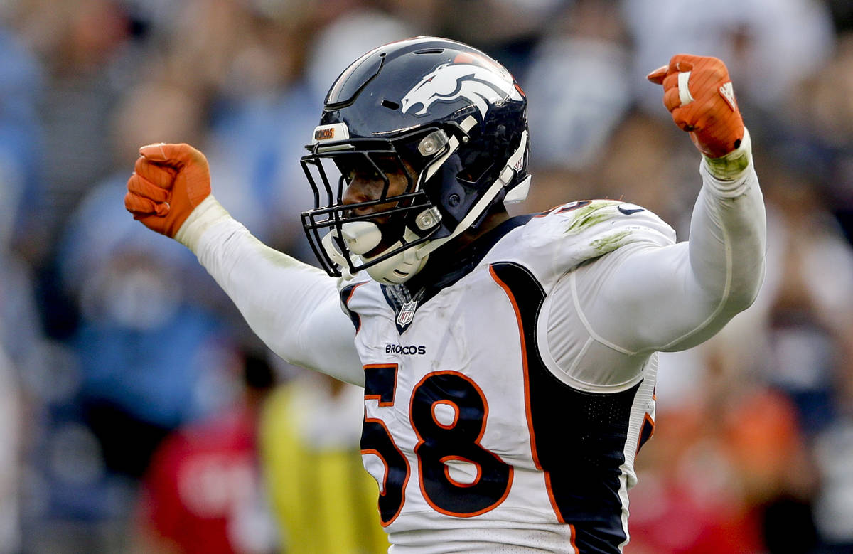 FILE - In this Dec. 6, 2015, file photo, Denver Broncos outside linebacker Von Miller celebrate ...