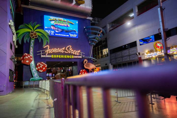 Gates block the entrance to the Fremont Street Experience in downtown Las Vegas, which is close ...