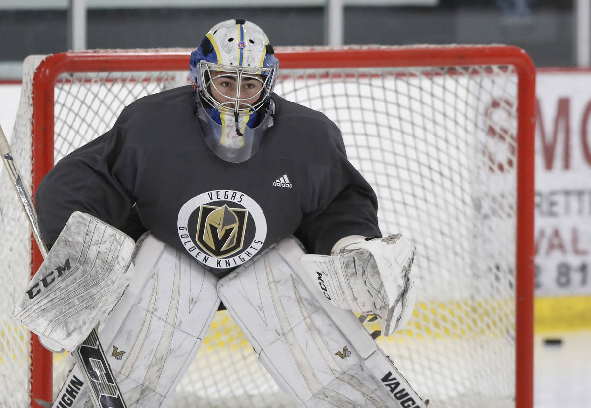 Vegas Golden Knights' goalie Jiri Patera keeps his eye on the puck during the team's developmen ...