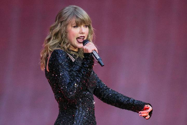 In this June 22, 2018, file photo, singer Taylor Swift performs on stage in concert at Wembley ...