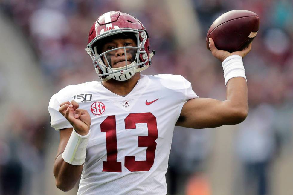 FILE - In this Oct. 12, 2019, file photo, Alabama quarterback Tua Tagovailoa passes against Tex ...