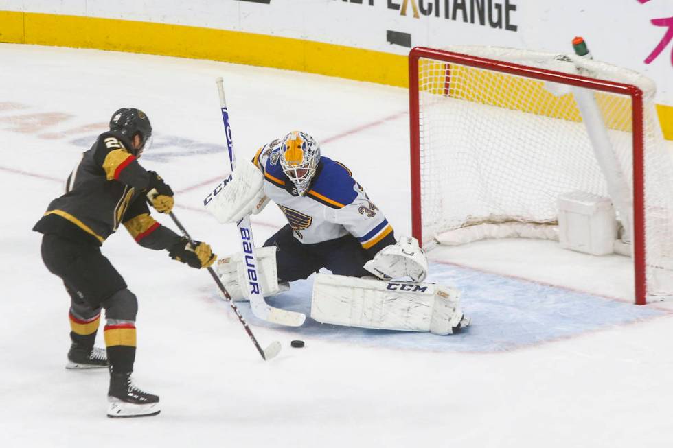 Golden Knights' Chandler Stephenson (20) lines up his game-winning shot against St. Louis Blues ...