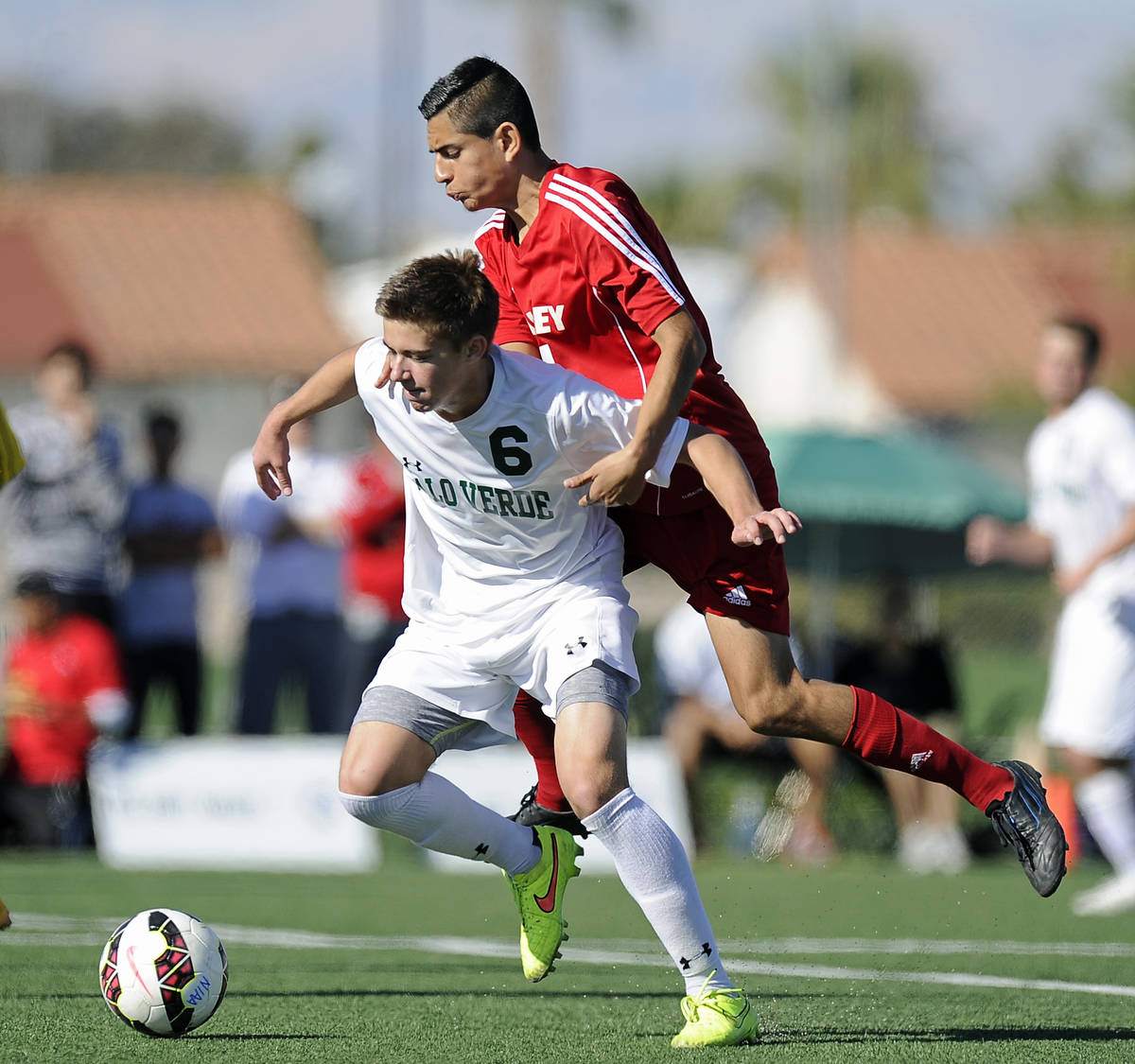 Valley midfielder John Cerda challenges Palo Verde midfielder Connor Ryan (6) during the Divisi ...