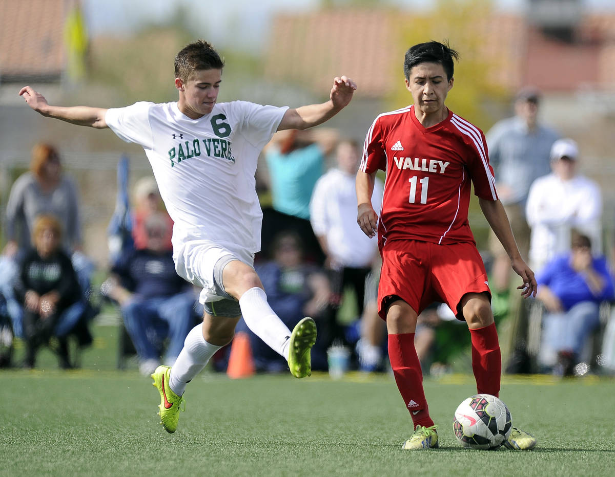 Palo Verde midfielder Connor Ryan (6) tries to block a pass by Valley forward Marco Gonzales (1 ...
