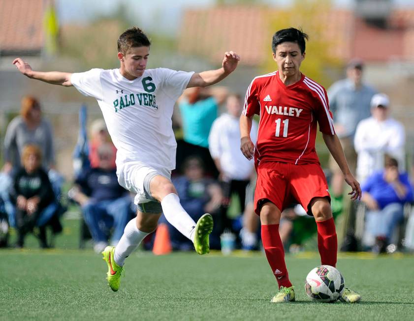 Palo Verde midfielder Connor Ryan (6) tries to block a pass by Valley forward Marco Gonzales (1 ...