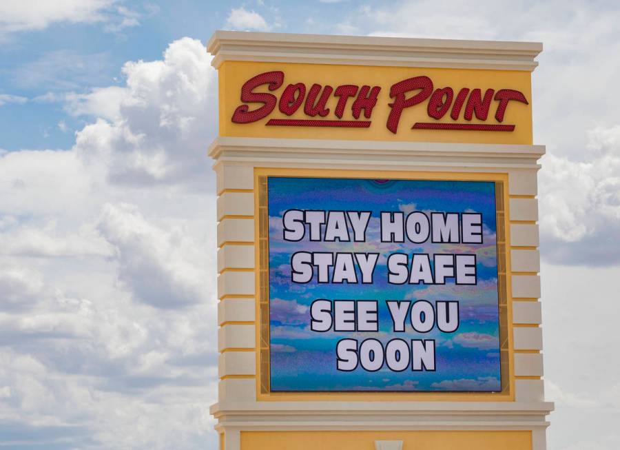 A South Point electronic marquee sign sends a message to stay home, at South Point in Las Vegas ...