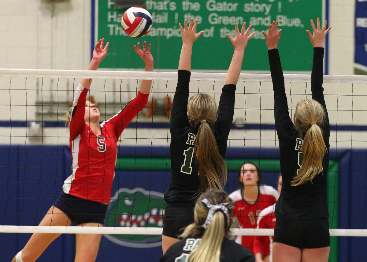 Coronado's Taylor Jackson (5) sends the ball over the net against Palo Verde during the champio ...