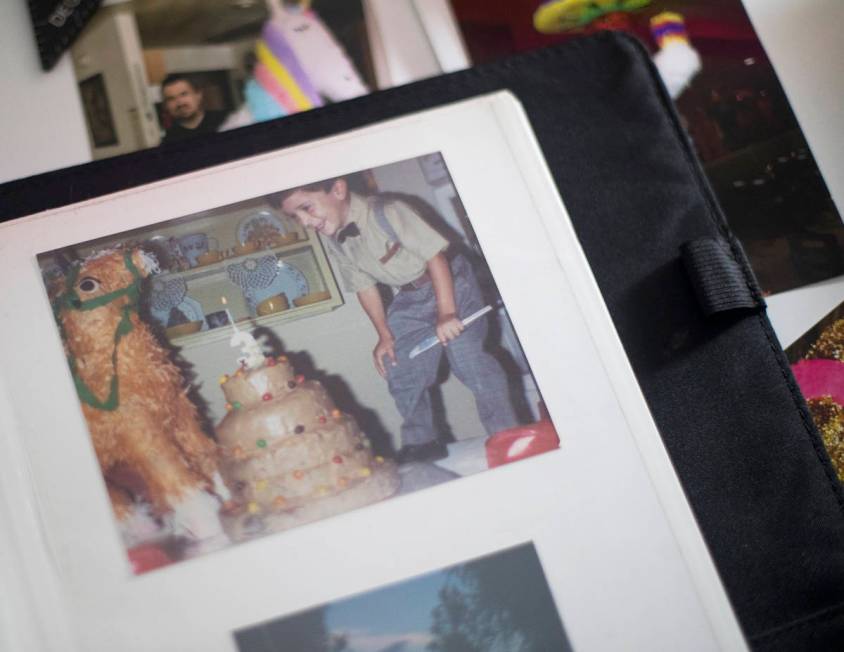 A photo of Omar Soto on his third birthday with a homemade pinata at his home studio in Las Veg ...