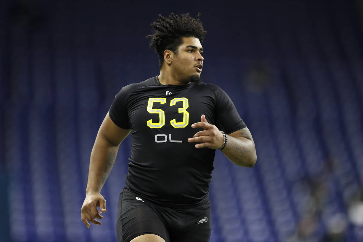 Iowa offensive lineman Tristan Wirfs runs the 40-yard dash at the NFL football scouting combine ...