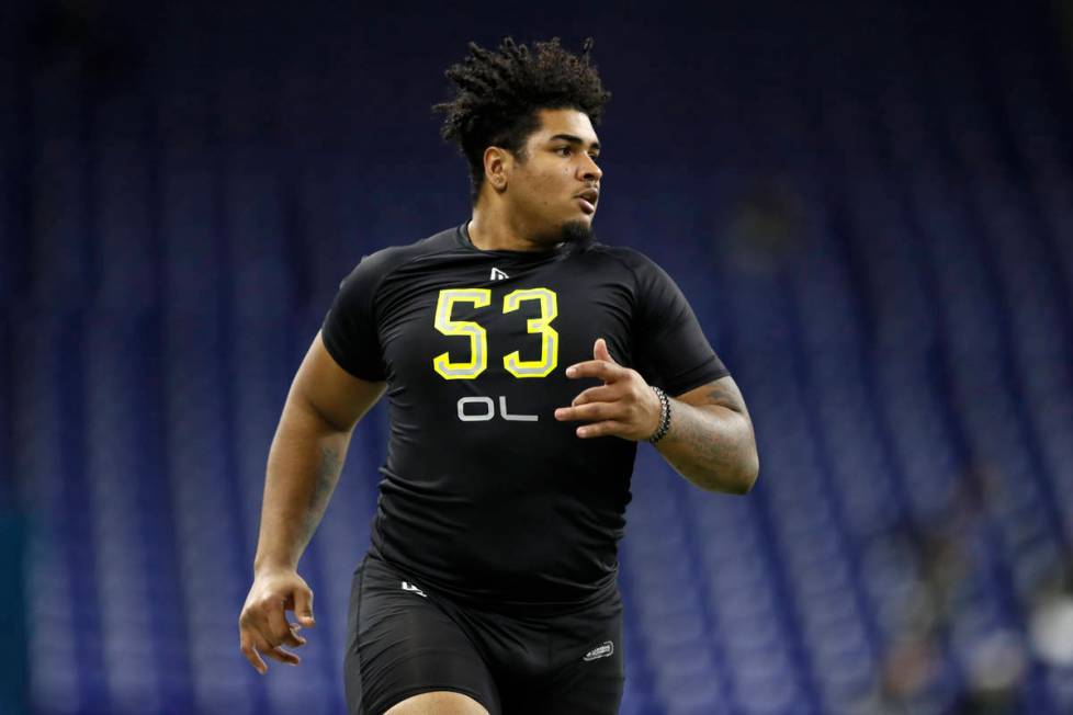 Iowa offensive lineman Tristan Wirfs runs the 40-yard dash at the NFL football scouting combine ...