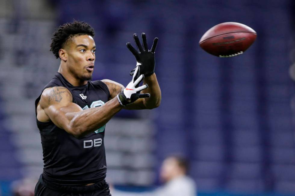 Southern Illinois defensive back Jeremy Chinn runs a drill at the NFL football scouting combine ...