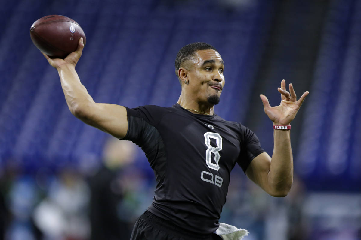 FILE - In this Feb. 27, 2020, file photo, Oklahoma quarterback Jalen Hurts runs a drill at the ...