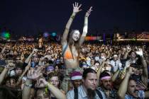 Fans cheer for Taylor Bennett, brother of Chance the Rapper, at the Huntridge Stage during the ...