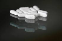 FILE - This Monday, April 6, 2020 file photo shows an arrangement of hydroxychloroquine pills i ...