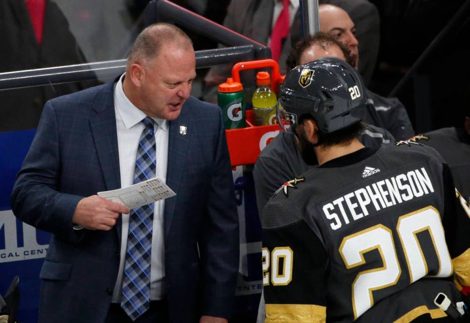 Vegas Golden Knights head coach Gerard Gallant talks to Vegas Golden Knights center Chandler St ...