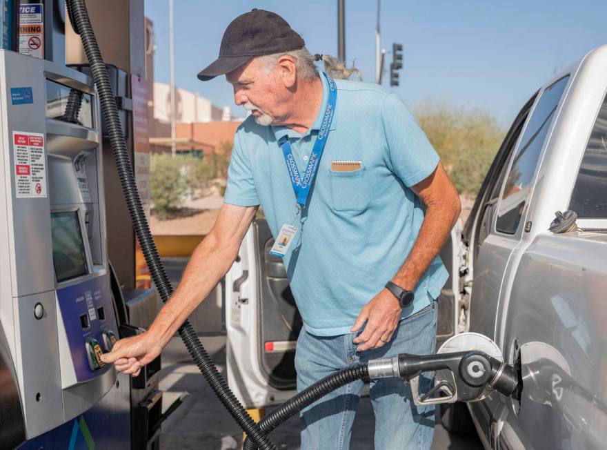 Jim Browning of Pahrump, fills up his gas tank at Sam's Club on East Serene Ave., in Las Vegas ...