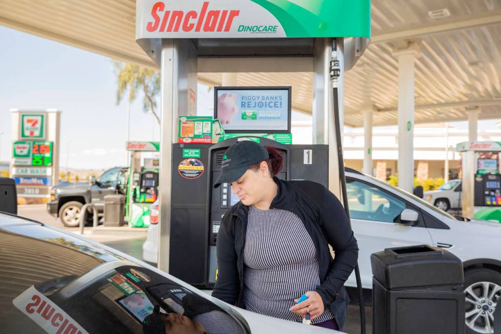 Tamara Sanchez of Las Vegas fills up her gas tank at Sinclair gas station on South Valley View ...