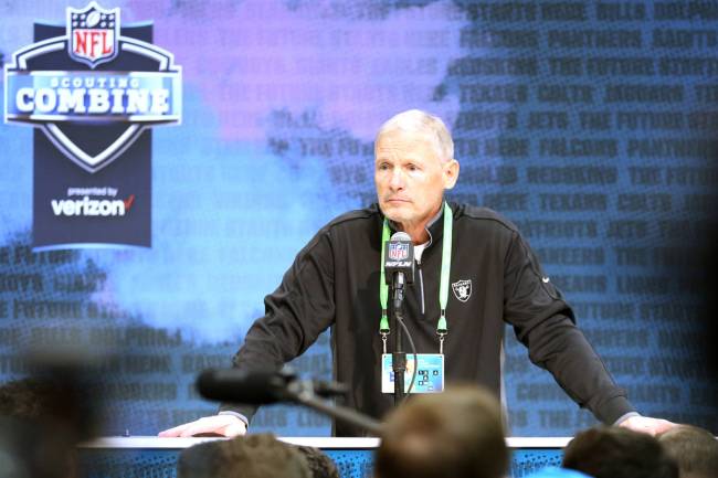 Las Vegas Raiders general manager Mike Mayock speaks at the NFL scouting combine at the Indiana ...