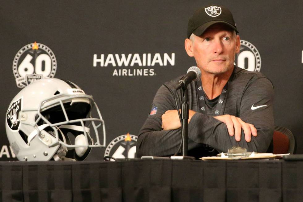 Oakland Raiders general manager Mike Mayock fields questions from the media at a press conferen ...