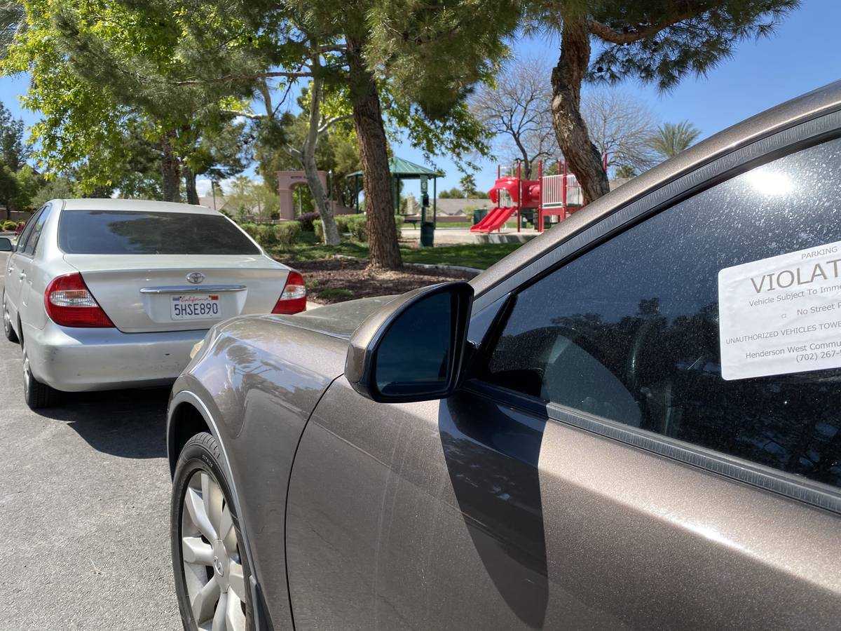 Last week, white stickers could be seen stuck to windows on a line of vehicles parked on Cozy H ...