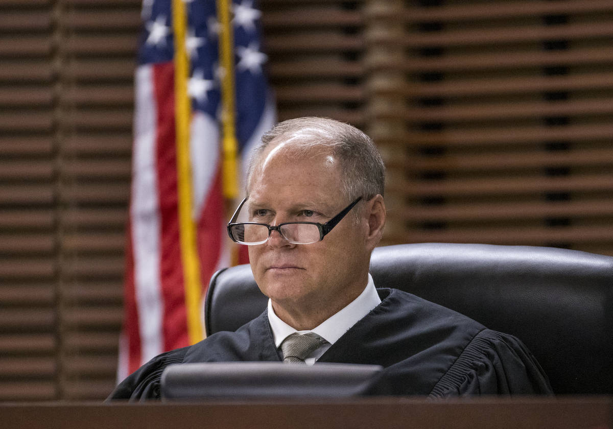 Justice of the Peace Stephen George presides over a court hearing for Joshua Nichols and George ...