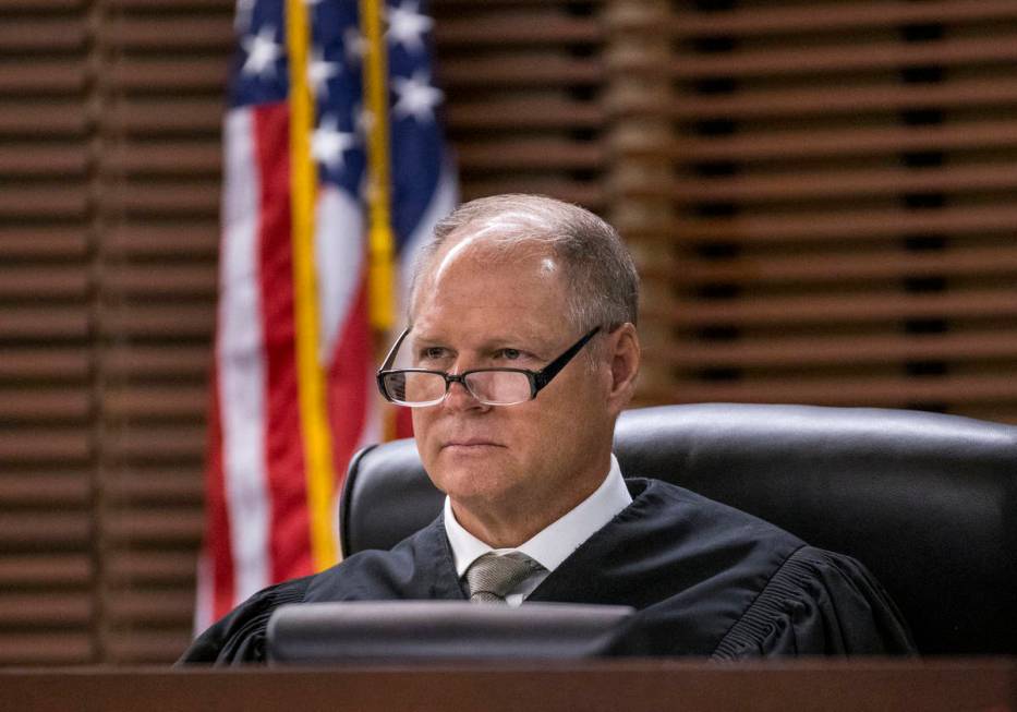 Justice of the Peace Stephen George presides over a court hearing for Joshua Nichols and George ...