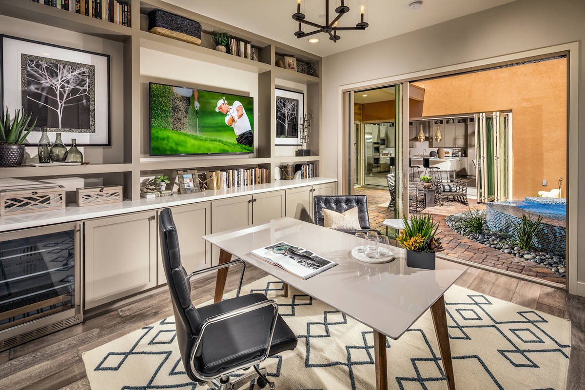 Ground your space with a colorful rug like the home office in the Indulge floor plan at Trilogy ...