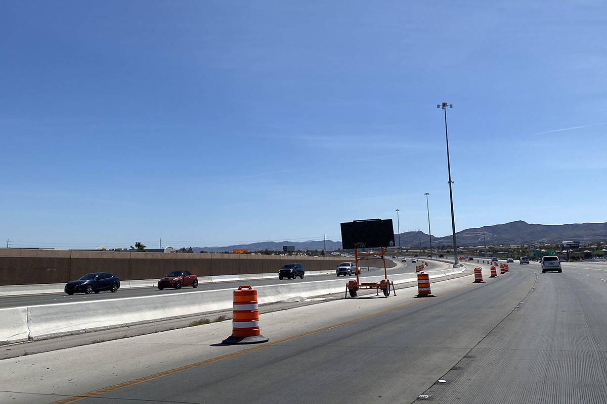 Work started on the yearlong $29.6 million project to widen the 215 from Pecos Road to Windmill ...