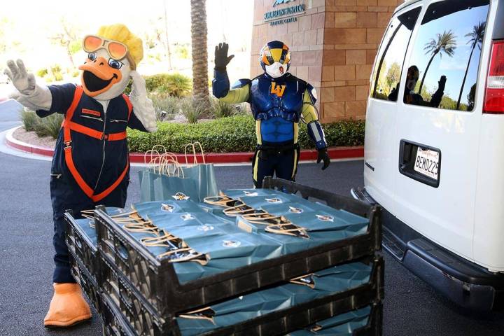 Las Vegas Aviators mascots Spruce and Aviator donate baseball swag at Summerlin Hospital Medica ...