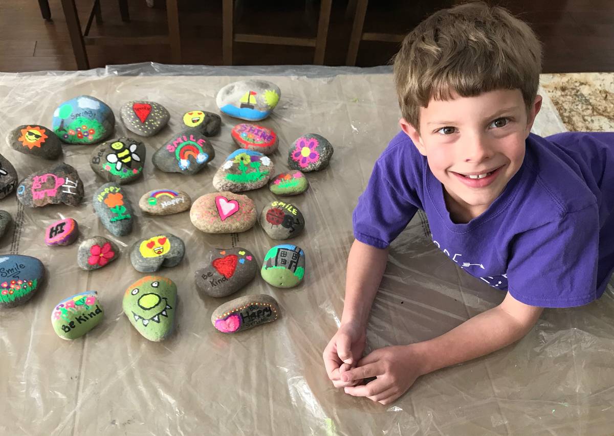 Las Vegas second-grader Braden Hahn paints rocks for neighbors. (Kimberly Hahn)