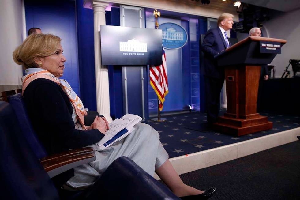 Dr. Deborah Birx, White House coronavirus response coordinator, listens as President Donald Tru ...