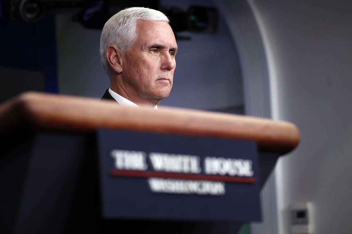 Vice President Mike Pence listens as President Donald Trump speaks about the coronavirus in the ...