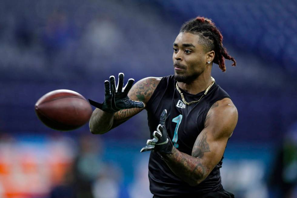 Ohio State defensive back Damon Arnette runs a drill at the NFL football scouting combine in In ...