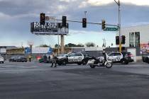 Las Vegas police investigate an officer-involved shooting on Tuesday, April 21, 2020, on the 40 ...