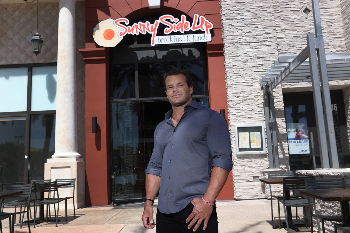 Nicholas Sord, owner of Sunny Side Up, poses for a photo outside of his restaurant at Boca Park ...