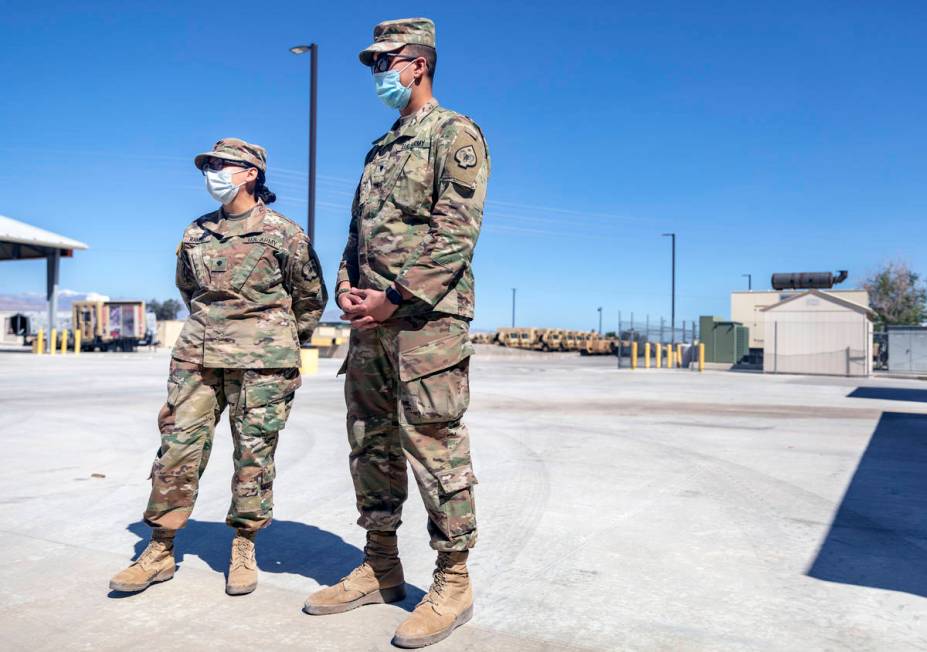 Spc. Iris Ramirez, left, and Spc.Karim Arafa discuss the mission of delivering personal protect ...