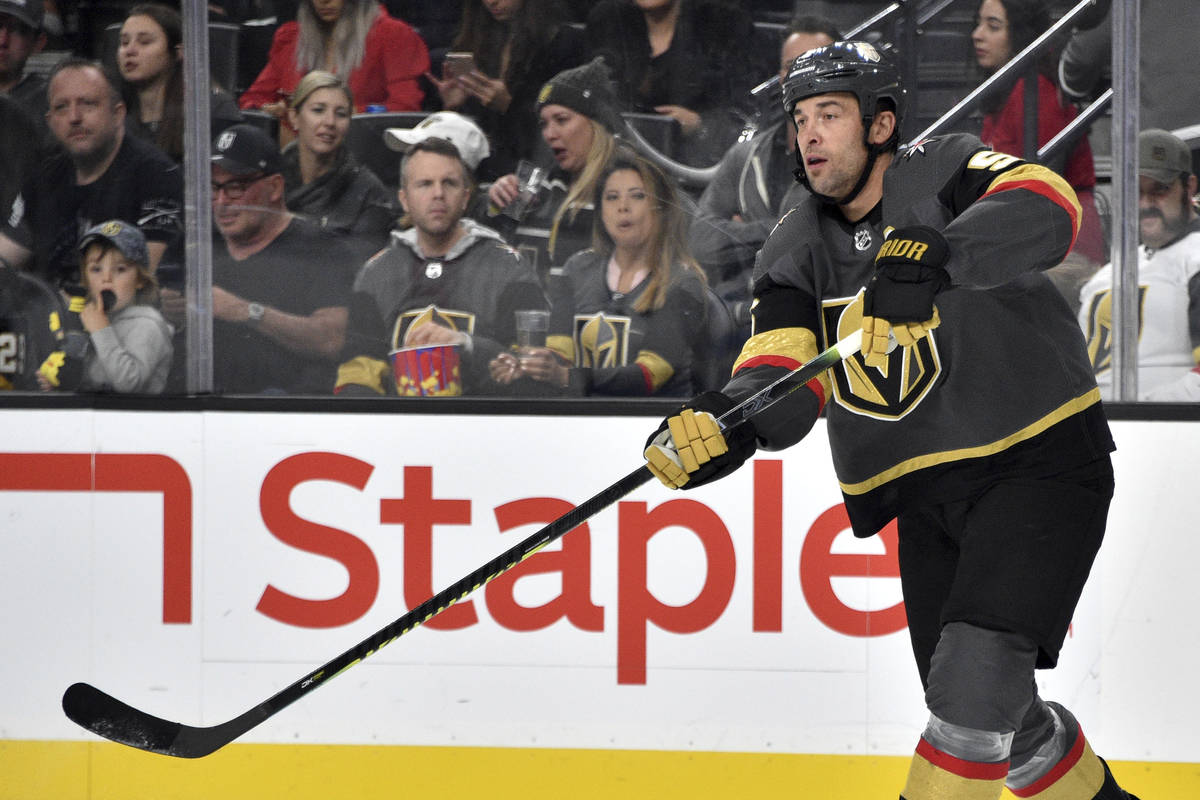 Vegas Golden Knights defenseman Deryk Engelland (5) passes the puck against the Winnipeg Jets d ...