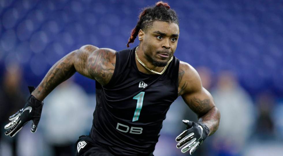 Ohio State defensive back Damon Arnette runs a drill at the NFL football scouting combine in In ...