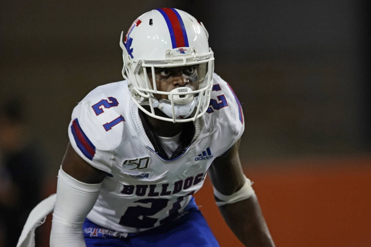 Louisiana Tech's Amik Robertson (21) defends against Texas during the second half of an NCAA co ...