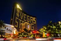 Traffic on the Strip passes by signage on Wynn Las Vegas showing support for the city during th ...