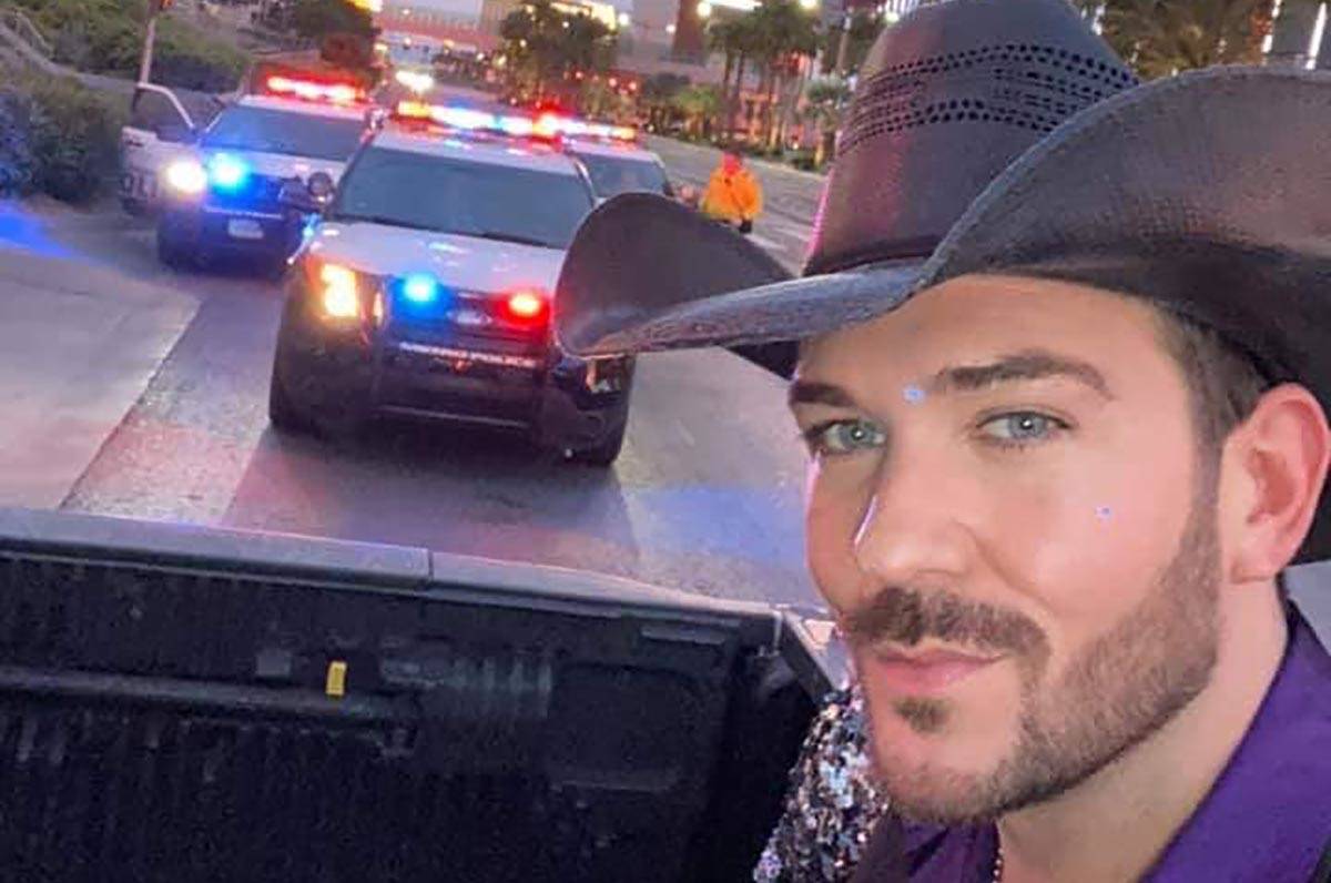 Las Vegas country artist Chase Brown takes a selfie with Metro units in the background on the S ...