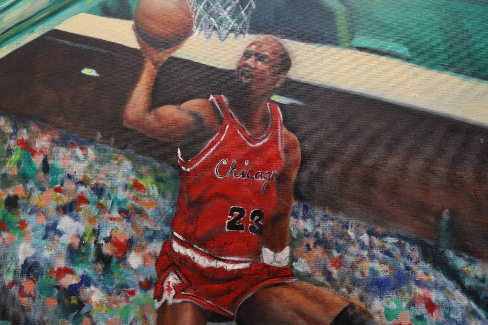 A signed Michael Jordan painting inside the home of Trent Othick in Las Vegas, Tuesday, April 2 ...