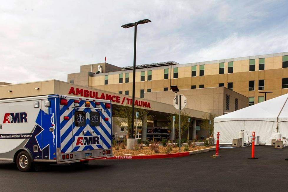 Sunrise Hospital has erected tents, currently empty, in their parking lot near emergency/trauma ...