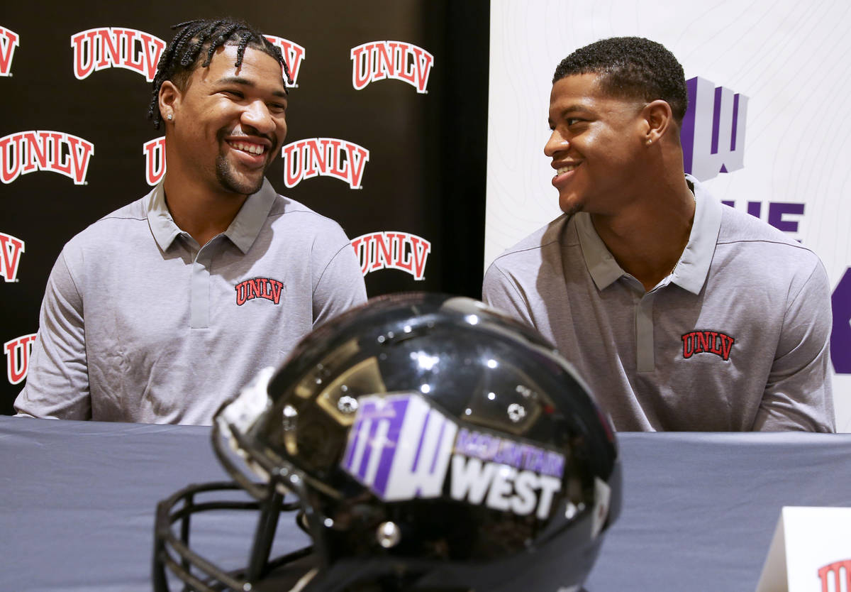 UNLV quarterback Armani Rogers, left, and linebacker Javin White talk to reporters during Mount ...